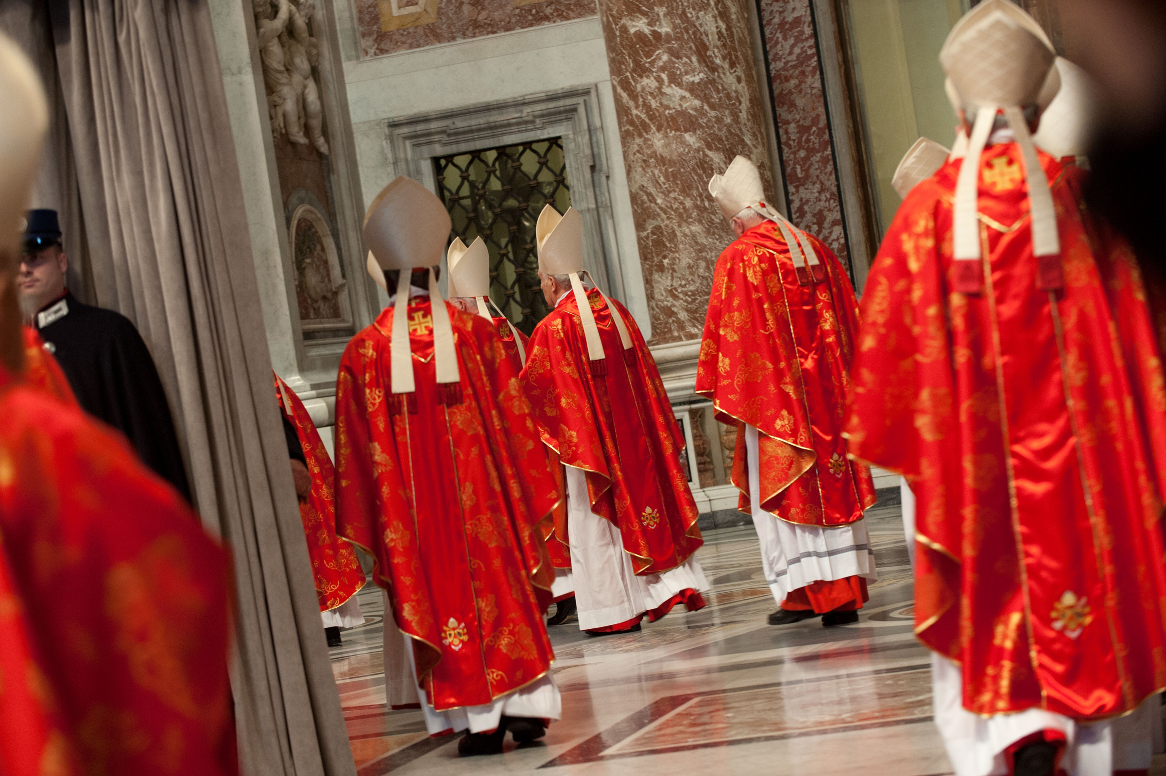 Cardinals enter 'Pro Eligendo Pontifice' mass at the St Peter's basilica on March 12, 2013, at the Vatican. RNS photo by Andrea Sabbadini
