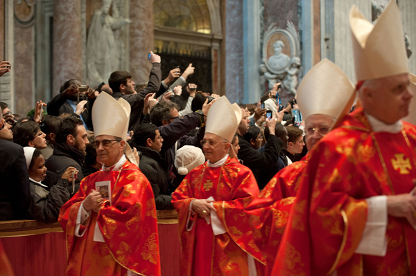 Cardinals enter Mass at St. Peter's Basilica on March 12, 2013 at the Vatican. RNS photo by Andrea Sabbadini