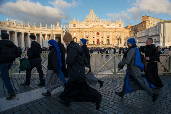 Priests and nuns arrive at the inauguration Mass of Pope Francis at St. Peter's square on Tuesday (March 19) at the Vatican. RNS photo by Andrea Sabbadini