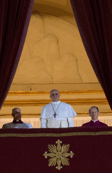 Newly elected Pope Francis appears on the central balcony of St. Peter's Basilica on March 13, 2013 in Vatican City. Now, he faces first-year scrutiny. RNS photo by Andrea Sabbadini