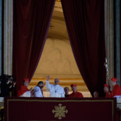 Newly elected Pope Francis appears on the central balcony of St. Peter's Basilica on Wednesday (March 13) in Vatican City. RNS photo by Andrea Sabbadini
