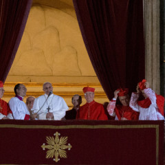 Newly elected Pope Francis appears on the central balcony of St. Peter's Basilica on Wednesday (March 13) in Vatican City, Vatican. RNS photo by Andrea Sabbadini