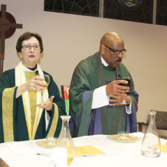 Jane Via, 65, a retired San Diego county prosecutor, celebrates mass with Dr. Jon Connor at Mary Magdalene Apostle Catholic Community in San Diego on Jan. 20. Via was ordained within the Catholic Womenpriests movement, which flaunts church law forbidding women's ordination. Photo courtesy Megan O'Neil
