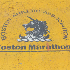 A Boston Athletic Association painting on the street near the finish line of the Boston Marathon.  Photo courtesy postcardjournal via Flickr (http://flic.kr/p/7uaryk)