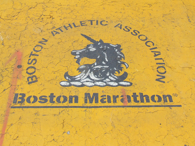 A Boston Athletic Association painting on the street near the finish line of the Boston Marathon.  Photo courtesy postcardjournal via Flickr (http://flic.kr/p/7uaryk)