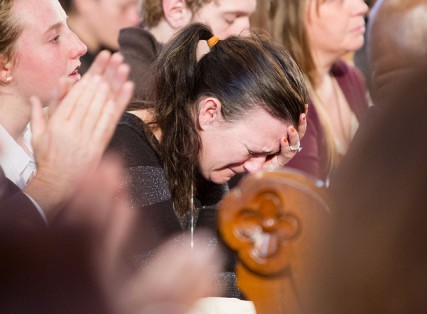 A woman cries during an interfaith memorial service for victims of the Boston Marathon bombing at the Cathedral of the Holy Cross. Photo courtesy Gregory Tracy/The Boston Pilot