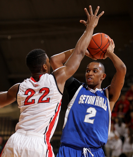Seton Hall Pirates forward Brandon Mobley (2) looks to pass against Rutgers Scarlet Knights forward Kadeem Jack (22) during their game Feb. 12, 2013 at Rutgers Athletic Center. Photo by Saed Hindash/The Star-Ledger