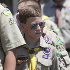 A Boy Scout marches with his troop during the Memorial Day parade in Smithtown, N.Y., May 27. RNS photo by Gregory A. Shemitz