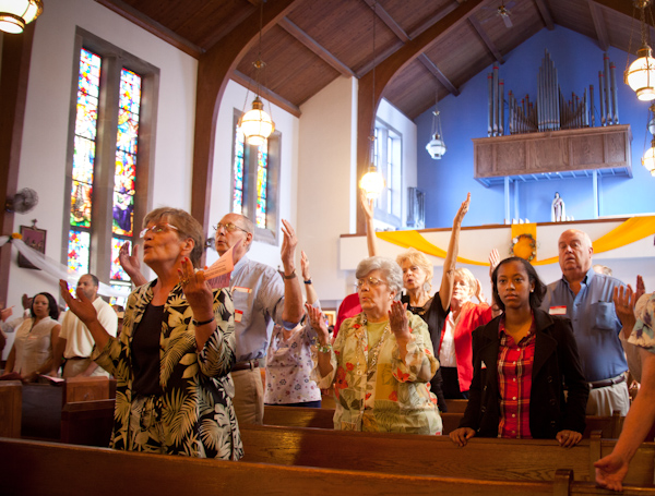 Congregants pray during Catholic Mass at St. Therese Little Flower Parish in Kansas City, Mo., on May 20, 2012. Religion News Service photo by Sally Morrow