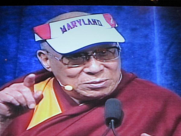 The Dalai Lama sports a University of Maryland visor as he delivers the annual Anwar Sadat Lecture for Peace at the university. RNS photo by Lauren Markoe