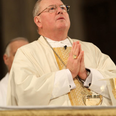 Cardinal Timothy M. Dolan of New York prays during a Mass at St. Patrick's Cathedral in New York May 2, 2013. RNS photo by Gregory A. Shemitz