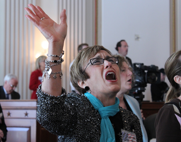 Anita Hensley of Kansas City, Mo., joins in worship at the National Day of Prayer observance on Capitol Hill on Thursday (May 2). RNS photo by Adelle M. Banks