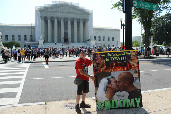 Ronald Brock, a Detroit native who travels the country sharing a “prophetic message” from God, stood outside the Supreme Court Tuesday (June 25) hoping for a decision against gay marriage. RNS photo by Adelle M. Banks