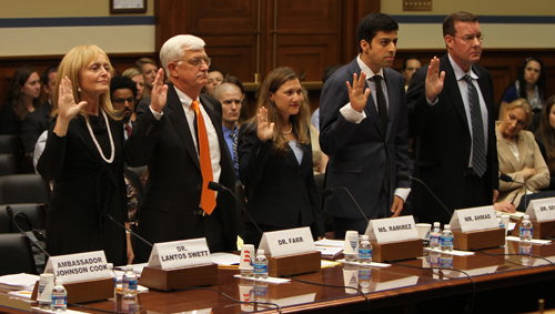 Witnesses, including USCIRF Chairwoman Katrina Lantos Swett, left, and Thomas Farr, second from left, are sworn in at the first-ever congressional hearing on the International Religious Freedom Act. RNS photo courtesy House Committee on Government Oversight.