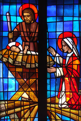 (RNS) A stained glass window at St. Andrew's Episcopal Cathedral in Honolulu, Hawaii, depicts the nativity scene with Mary, Joseph, and baby Jesus. RNS photo by Kevin Eckstrom.