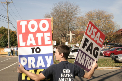 Westboro Baptist Church members protest at a Presbyterian church in Madison, Wis. Photo courtesy cometstarmoon via Flickr