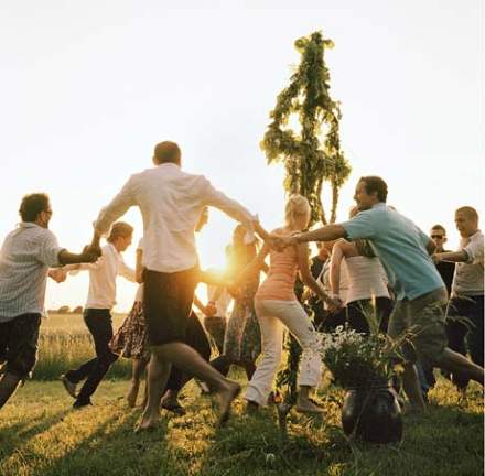 Dancing and singing around the maypole is a vital ingredient of Swedish Midsummer festivities. Photo: www.imagebank.sweden.se