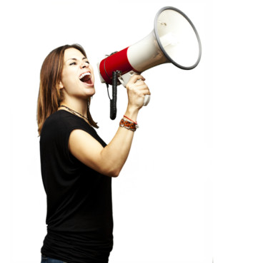 Young woman shouting into megaphone photo courtesy Shutterstock