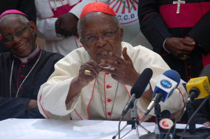 Cardinal John Njue addresses journalists at a news conference in Nairobi on 29 June. He said we have to be proud of who we are. Photo by Fredrick Nzwili