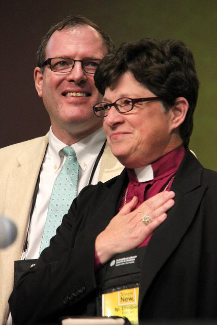 Lutherans elected the Rev. Elizabeth Eaton to be its first female presiding bishop of the Evangelical Lutheran Church in America. She is married to the Rev. Conrad Selnick (left), an Episcopal priest. Photo courtesy of ELCA News Service.