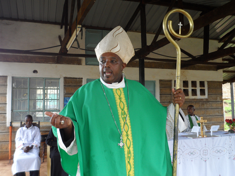 The Rev. Peter Njogu, a former Roman Catholic priest who is now the bishop of Restored Universal Apostolic Church in Kenya, conducts a Mass in the church. Religion News Service photo by Fredrick Nzwili