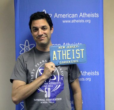  David Silverman with retired "ATHEIST" New Jersey plate. Photo courtesy Dave Muscato/American Atheists