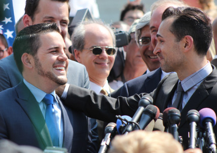 Plaintiffs Paul Katami, left, and Jeff Zarillo, who argued against California’s Proposition 8, speak to the media Wednesday (June 26) after the Supreme Court rejected Prop 8 on legal grounds. RNS photo by Adelle M. Banks
