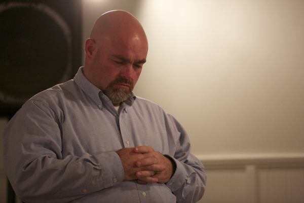 Pastor Jamie Coots prays during a service in Middlesboro, KY. Photo courtesy National Geographic Channel