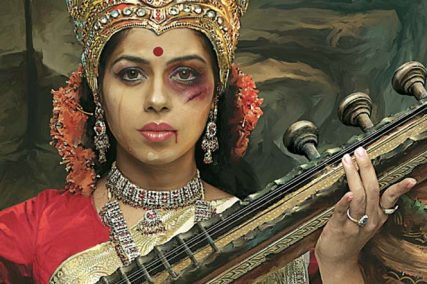 Goddess Saraswati holding her Veena with a bruised face. 