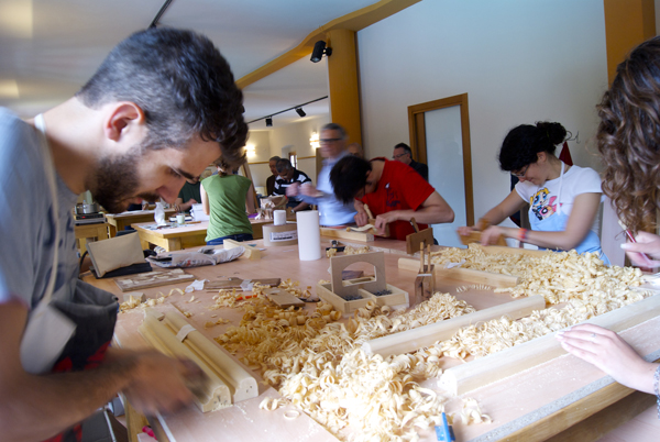 Students work on a project with wood at Florence's Sacred Art School. RNS photo by Alessandro Speciale