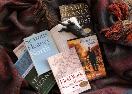 A few of Seamus Heaney's poetry collections, including "Field Work," Cathleen's favorite open to "The Otter," one of her favorite of the late Irish poet's works. The brass otter was a gift to Falsani from her husband. Photo by Cathleen Falsani / Orange County Register