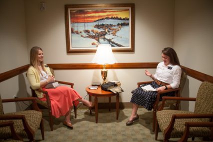 (Left) Sister Moody, from Elk Ridge, Utah, and Sister Ray from Atlanta share their companionship study while carrying out their mission at the Church of Jesus Christ of Latter-day Saints' Independence Visitors' Center in Independence, Mo., on Sept. 10, 2013. RNS photo by Sally Morrow