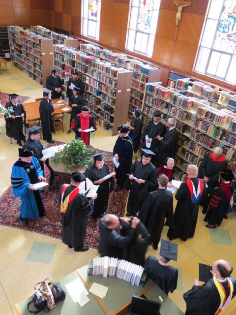 Faculty and candidates for Graduation assemble in the Bruening-Marotta Library of Saint Mary Seminary in Wickliffe, Ohio on May 8, 2013. Photo by Renata M. Courey / courtesy Saint Mary Seminary and Graduate School of Theology and Diocese of Cleveland