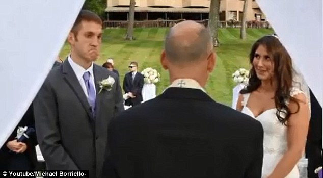 A couple was left visibly stunned after a wedding officiant scolded their photographer.
