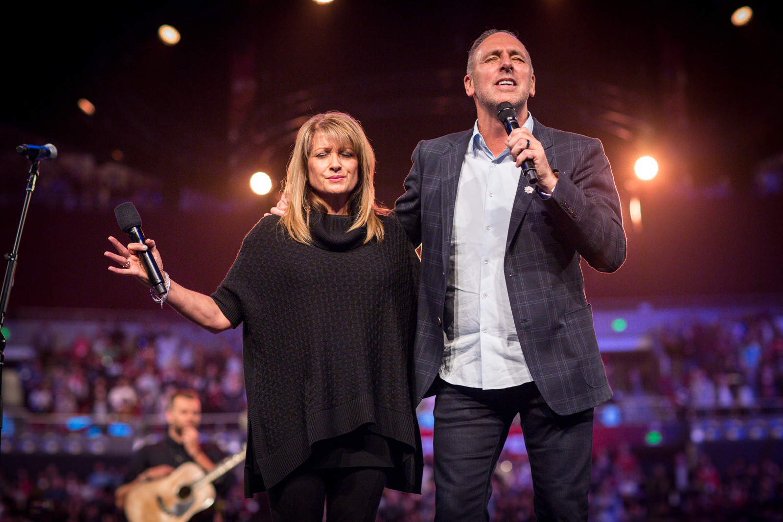 Senior Pastors Brian and Bobbie Houston in prayer at Hillsong Church. Photo courtesy Hillsong Church