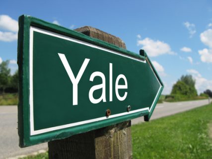 Road sign to Yale. Image courtesy of Pincasso via Shutterstock.