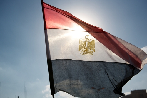 The Egyptian flag waving in Tahrir square in Cairo, Egypt (Jan. 2011). 