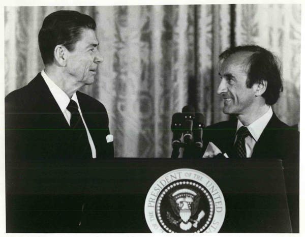 President Reagan is joined at the podium by Elie Wiesel, chairman of the United States Holocaust Memorial Council, during a Day of Remembrance ceremony on April 20, 1981, at the White House. Religion News Service file photo
