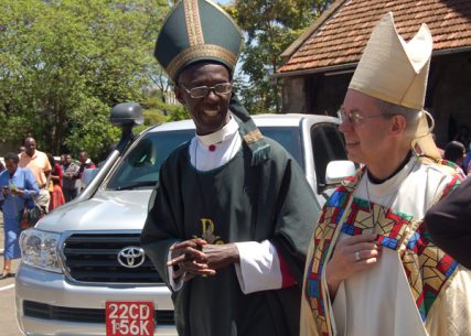 Archbishop Justin Welby of Canterbury and GAFCON Chairman Archbishop Wabukala of Kenya walk together at All Saints Cathedral in Nairobi. Welby visited Kenya before the GAFCON II meeting in Nairobi. RNS photo by Fredrick Nzwili