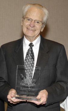 The Rev. William A. Holmes, Northaven Methodist Church, receives the Distinguished Alumni Award from SMU's Perkins School of Theology in 2007. Photo courtesy SMU Office of Public Affairs