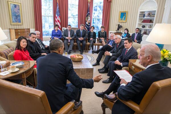 President Barack Obama and Vice President Joe Biden meet with faith leaders to discuss immigration reform at the White House on Wednesday (Nov. 13).