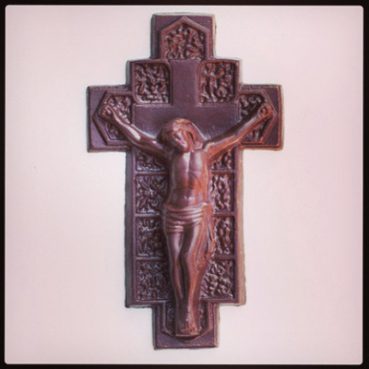Photo of a chocolate Jesus on the cross.