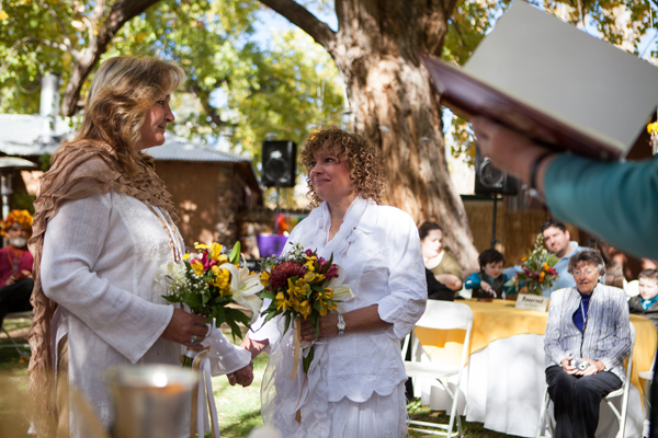 Tanya Struble looks at Therese Councilor during their wedding. The couple has been together for 23 years, they got married Saturday at a hot springs in Jemez Springs, N.M. They are one of the couples in a lawsuit to try to legalize gay marriage in New Mexico. Photo by Steven St John, courtesy USA Today