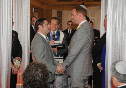 A same-sex couple say their vows during a Jewish ceremony. Photo courtesy Jacqui DePas Photography