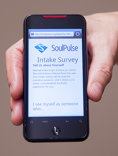 People can sign up at www.soulpulse.org for a two-week survey in which they’ll receive two daily questionnaires via text or email or both. Photo courtesy of Sean Flynn/UConn Photo