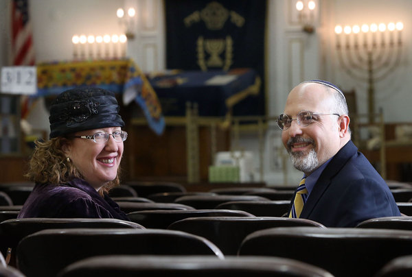 Rabbi Hyim Shafner, right, and wife Sara Winkelman, pose for a portrait at Bais Abraham Congregation in University City, on Friday (Jan. 24). On Sunday (Jan. 26) Bais Abraham Congregation held a postnuptial signing party so that even couples who are already married can avoid the pitfalls of breaking free from a Jewish marriage. Photo by Stephanie S. Cordle, St. Louis Post-Dispatch