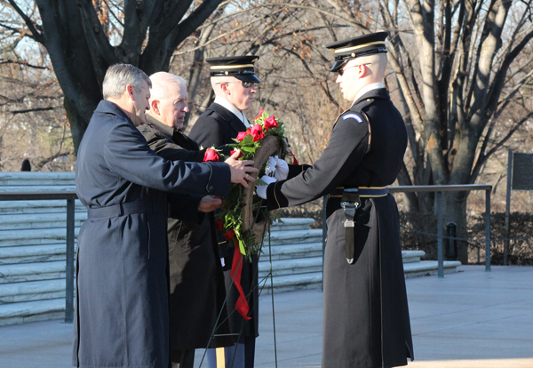 Left to right, CH, BG, David H. Cyr, USAF, Ret., CH (COL) John Schumacher, USA (Ret), Sentinel, and Sergeant of the Guard place a wreath at theTomb of the Unknowns on Jan. 16, 2014. RNS photo by Adelle M. Banks