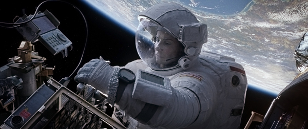 Sandra Bullock, as a scientist lost in space, struggles with faith in 