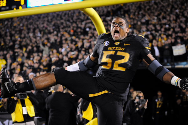 University of Missouri football player Michael Sam, who went public about being gay last spring, celebrates during a game in November 2013 against Texas A&M at Faurot Field Memorial Stadium in Columbia, Mo. RNS photo by Shane Epping