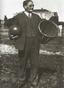 James Naismith with a basketball and a basket.